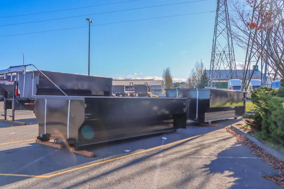 Roll-off dumpster ready for waste disposal at job site for Demolition Dumpster Rental in West Lealman